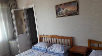 Трехместный номер в Гостинице Gostinitsa Dubok